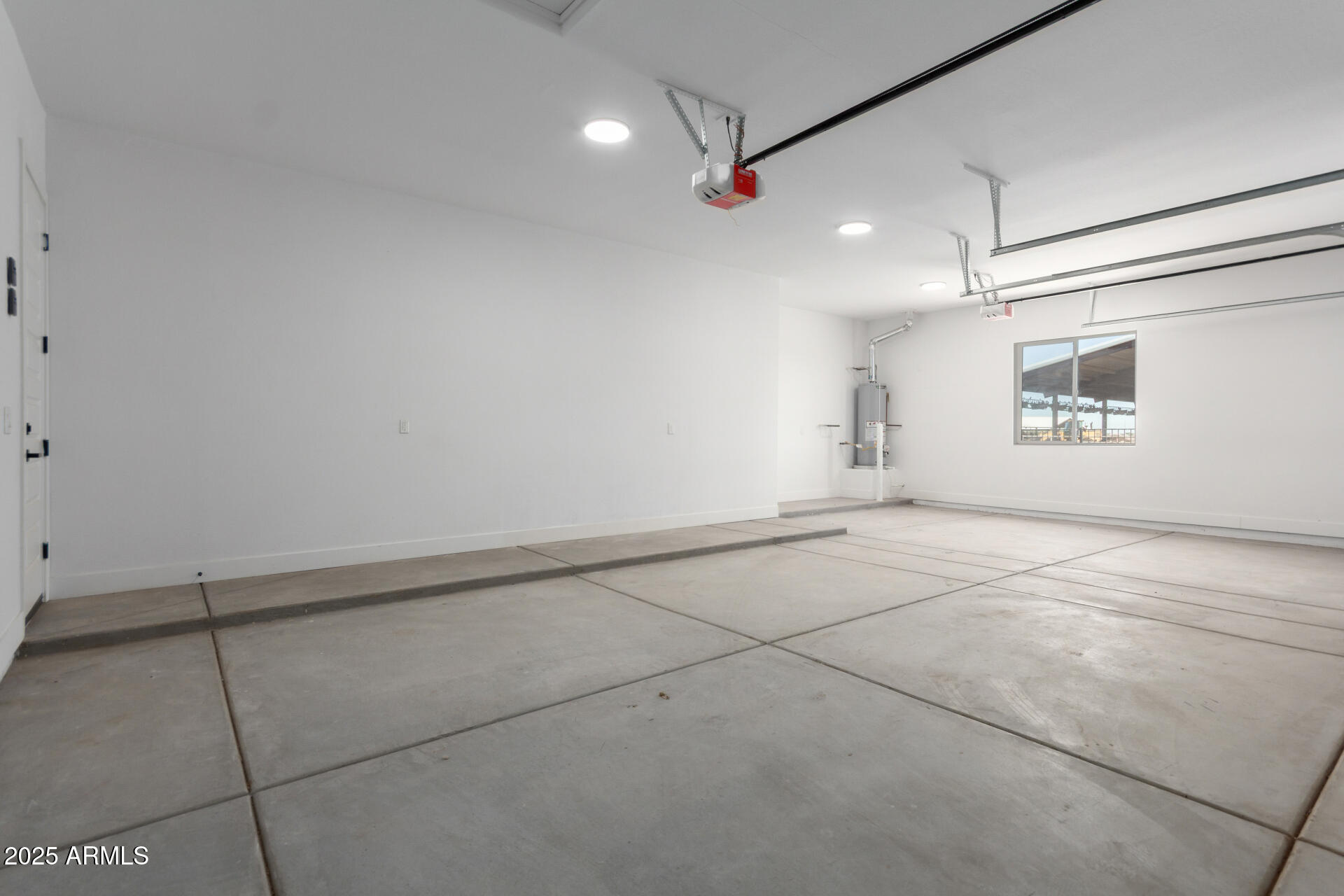 19657 West Dunlap Road Buckeye, AZ 85326 - Photo 41 of 45 a view of an empty room with a window
