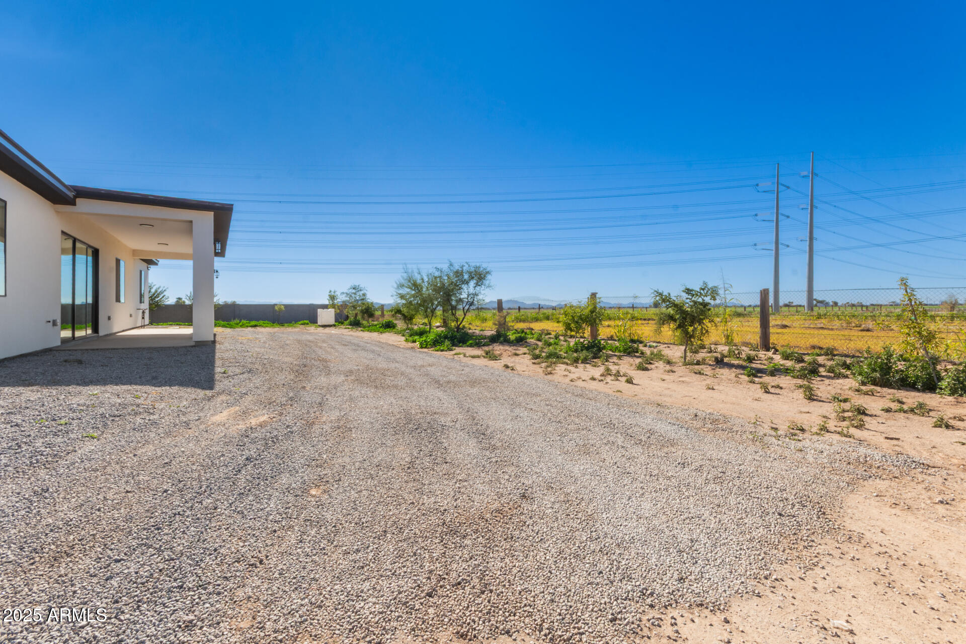 19657 West Dunlap Road Buckeye, AZ 85326 - Photo 42 of 45 a view of a house with a yard