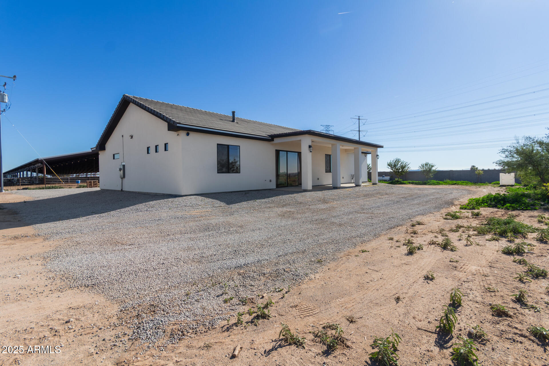 19657 West Dunlap Road Buckeye, AZ 85326 - Photo 43 of 45 a view of a house with a yard