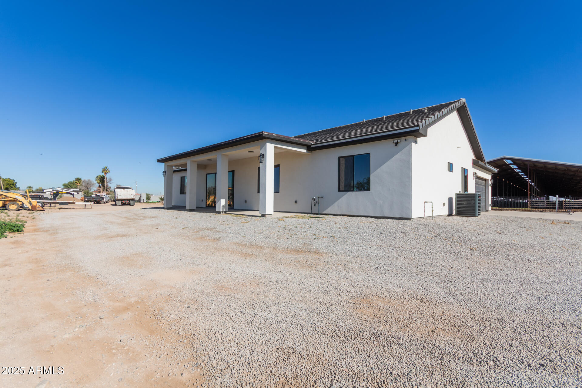 19657 West Dunlap Road Buckeye, AZ 85326 - Photo 45 of 45 a view of house with yard and hallway