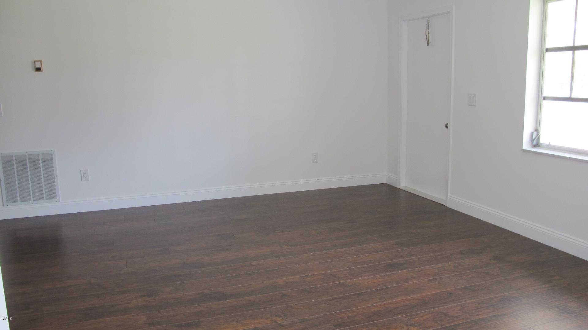 11143 Mustang Street Boca Raton, FL 33428 - Photo 6 of 16 Living room has new flooring & paint.