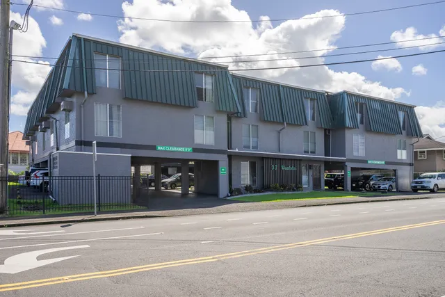 a view of a building and a street