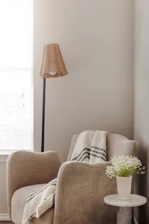 a bedroom with bed and wooden floor