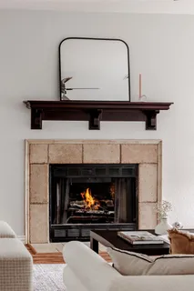 a living room with a fireplace