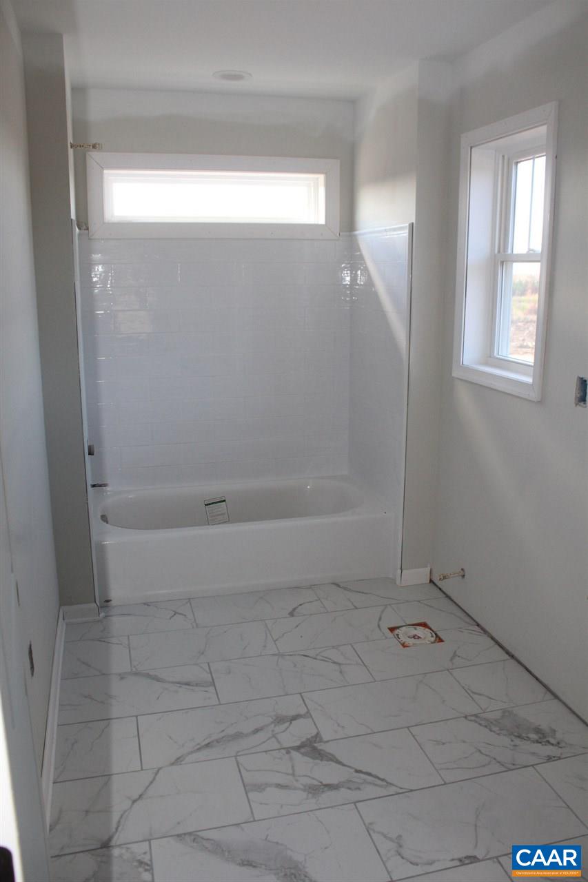 703 Correctional Center Road Dillwyn, VA 23936 - Photo 13 of 13 a bathroom with a bathtub