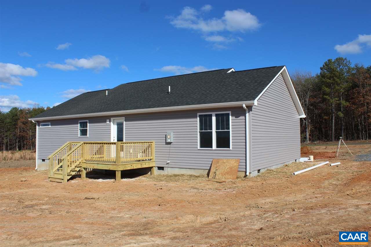 703 Correctional Center Road Dillwyn, VA 23936 - Photo 5 of 13 a front view of a house with a yard and garage