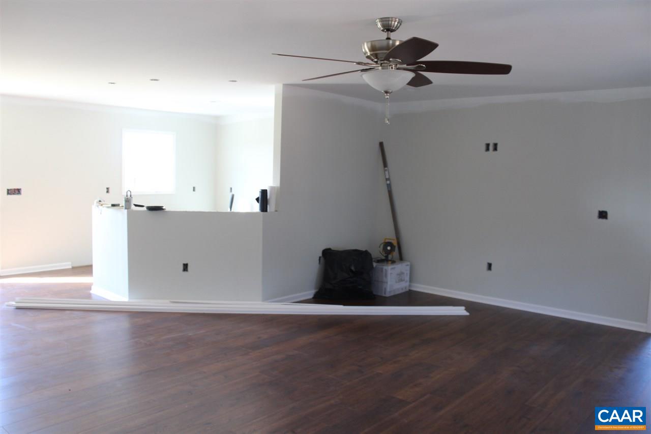 703 Correctional Center Road Dillwyn, VA 23936 - Photo 10 of 13 a room with window and a ceiling fan