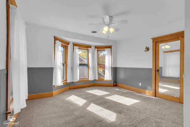 a view of entryway with wooden floor and stairs