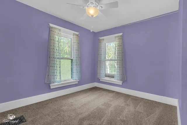 a bathroom with a sink a mirror and a shower
