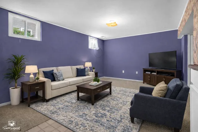 a view of an entryway with wooden floor and door