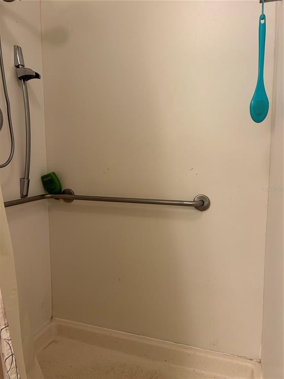 4775 Tri Par Drive Sarasota, FL 34234 - Photo 14 of 50 a bathroom with a shower