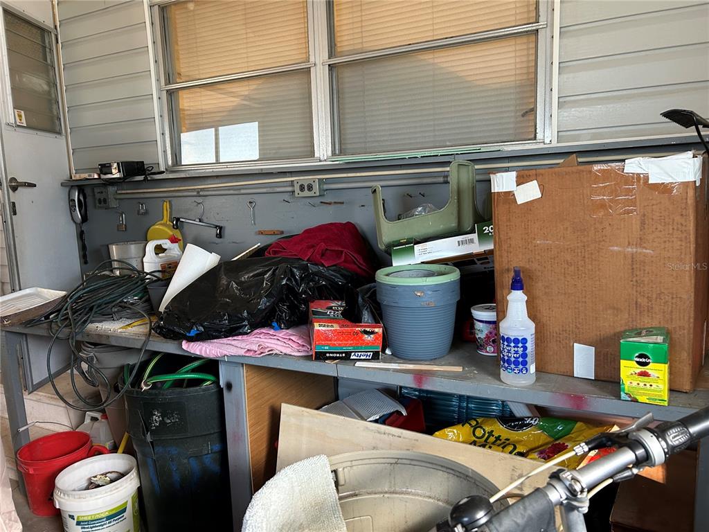 4775 Tri Par Drive Sarasota, FL 34234 - Photo 23 of 50 a store room with storage and utility