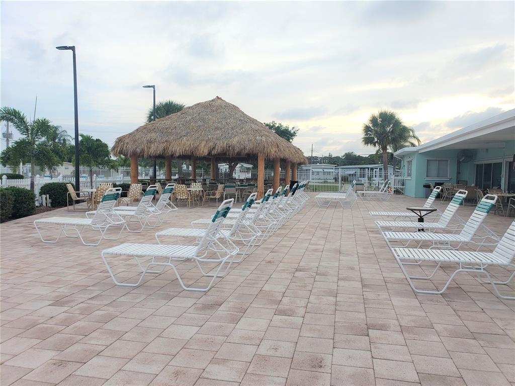 4775 Tri Par Drive Sarasota, FL 34234 - Photo 38 of 50 a view of a park with a bench