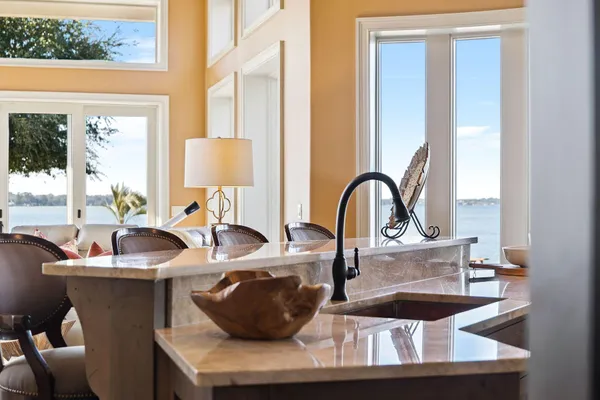a bathroom with a shower and a sink