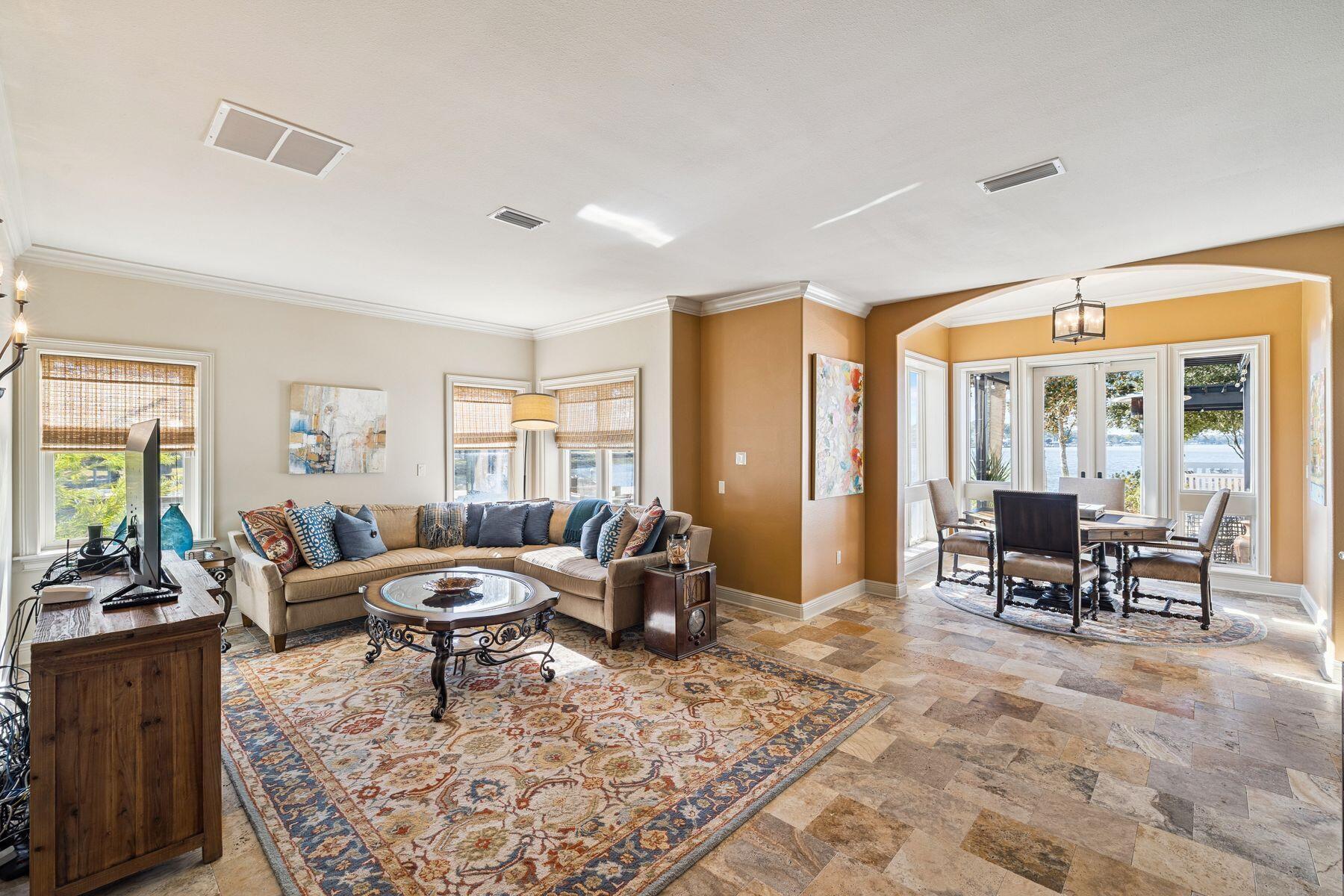 221 Bay Cir Drive Santa Rosa Beach, FL 32459 - Photo 26 of 98 a living room with furniture and large windows