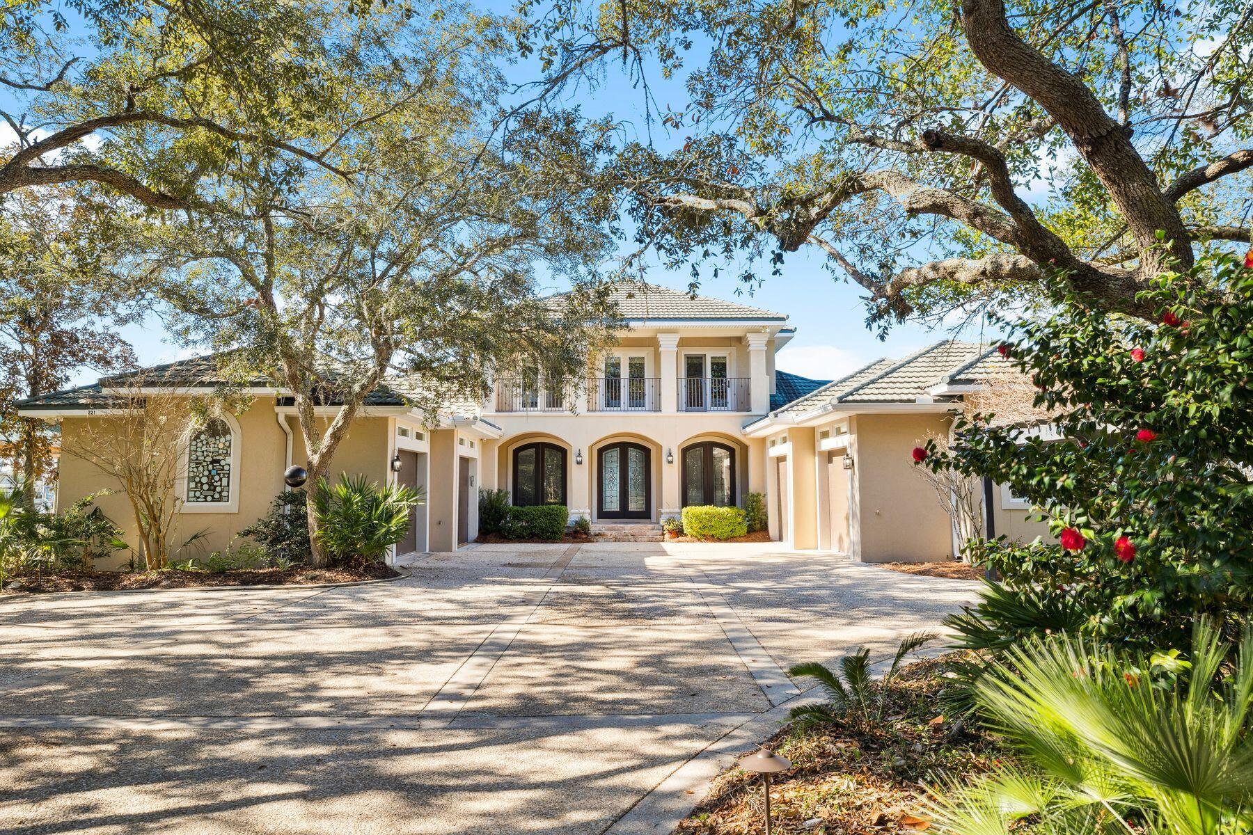 221 Bay Cir Drive Santa Rosa Beach, FL 32459 - Photo 7 of 98 a front view of a house with a yard