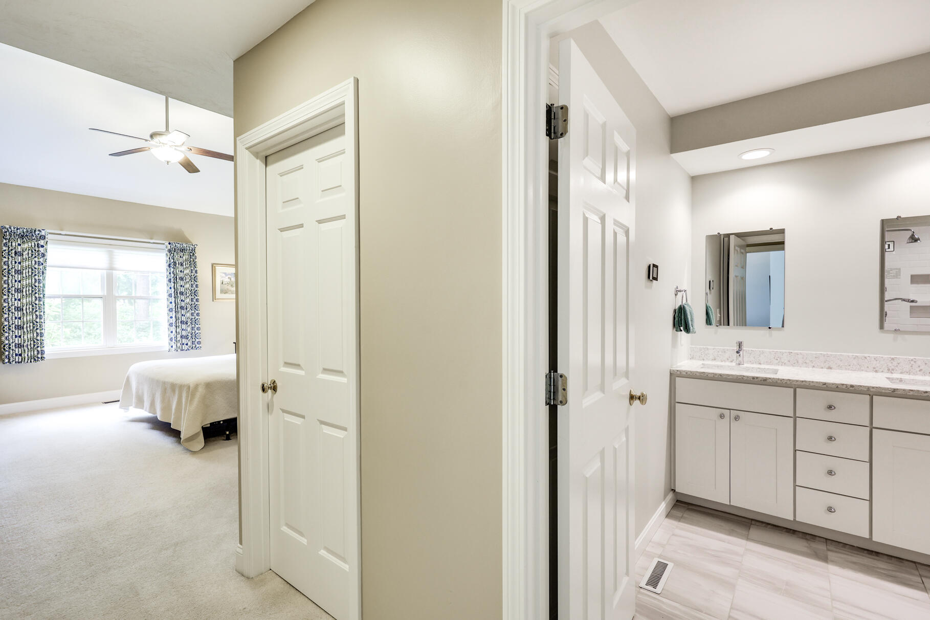 9 Stratford Ridge Mashpee, MA 02649 - Photo 19 of 34 a bathroom with a double vanity sink mirror and shower