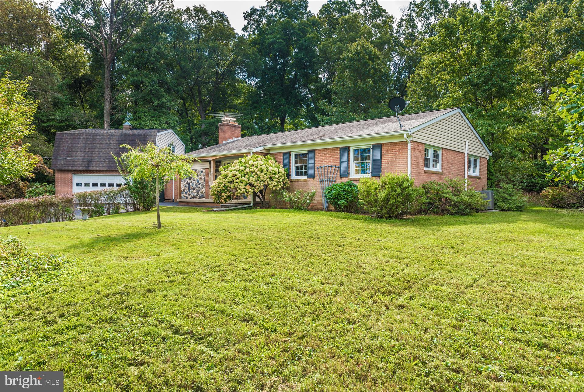 12539 Molasses Road Union Bridge, MD 21791 - Photo 1 of 30 a front view of a house with garden