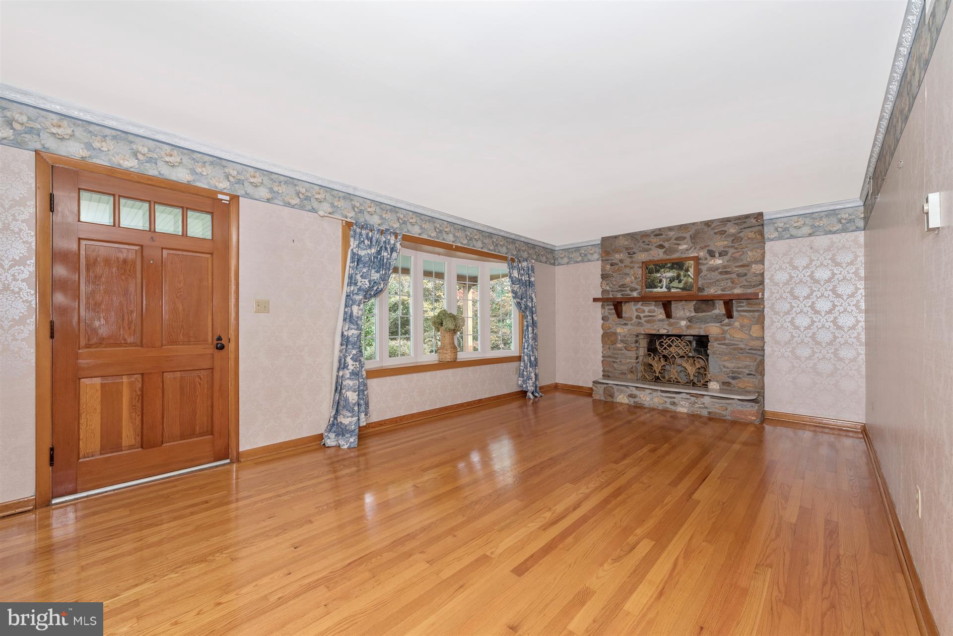 12539 Molasses Road Union Bridge, MD 21791 - Photo 12 of 30 wooden floor in an empty room with a window