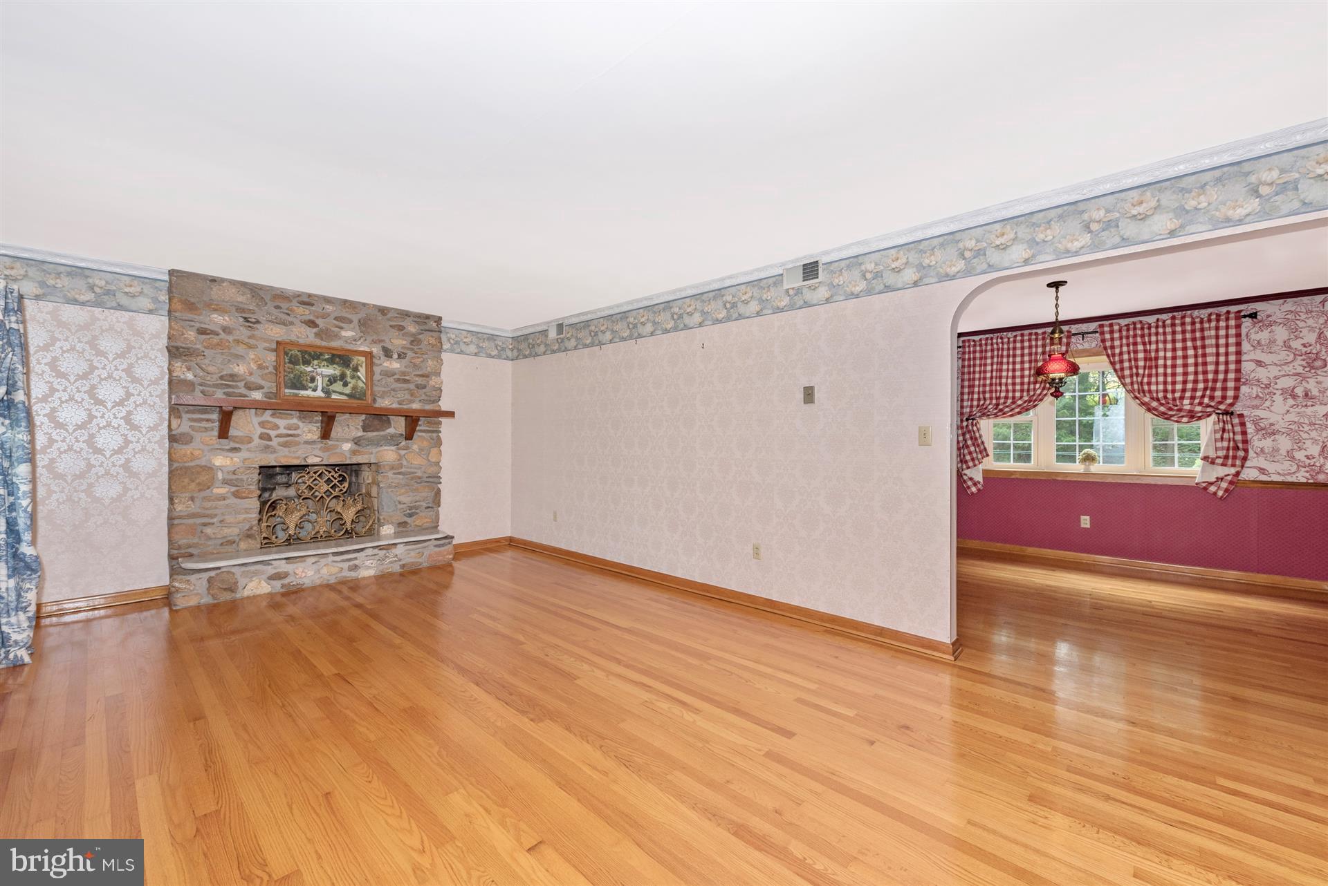 12539 Molasses Road Union Bridge, MD 21791 - Photo 13 of 30 a view of an empty room with wooden floor and a window
