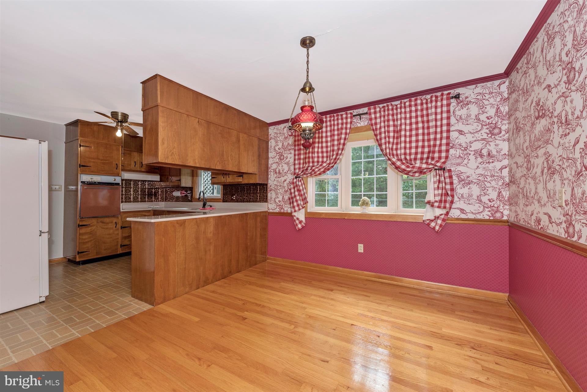 12539 Molasses Road Union Bridge, MD 21791 - Photo 15 of 30 a kitchen with stainless steel appliances kitchen island granite countertop a sink a stove top oven a counter space and cabinets