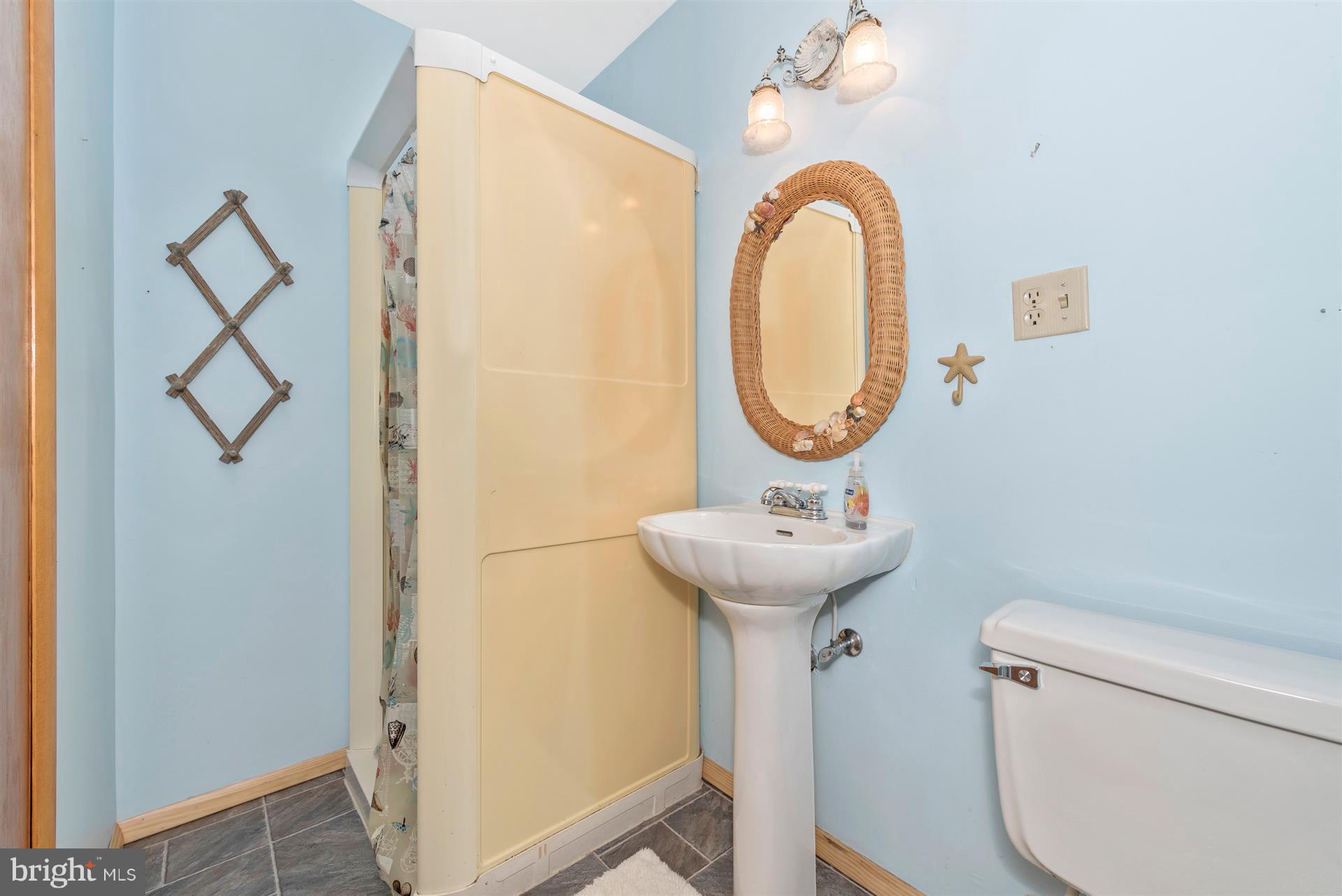 12539 Molasses Road Union Bridge, MD 21791 - Photo 23 of 30 a bathroom with a sink and a mirror