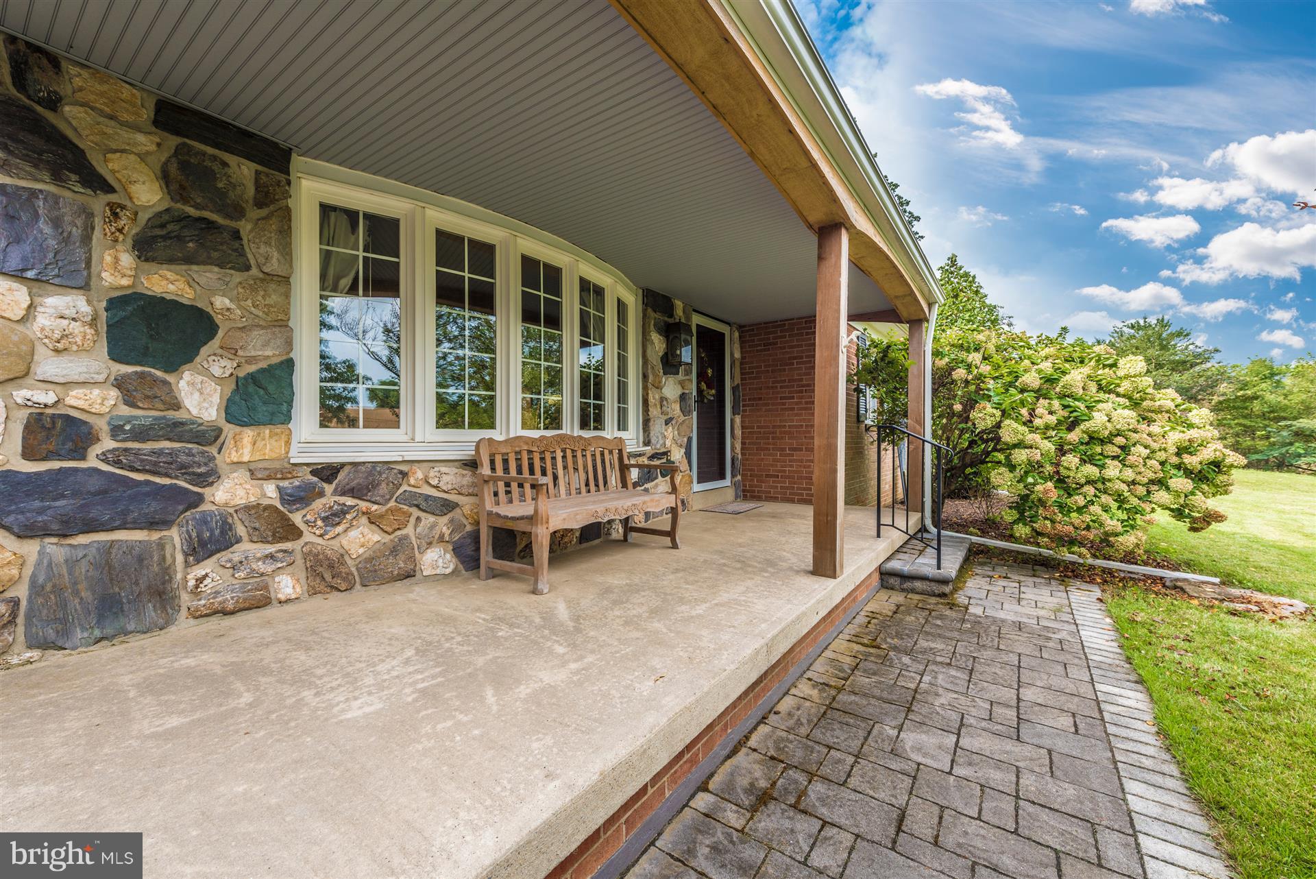 12539 Molasses Road Union Bridge, MD 21791 - Photo 4 of 30 a building outdoor space with patio furniture and garden