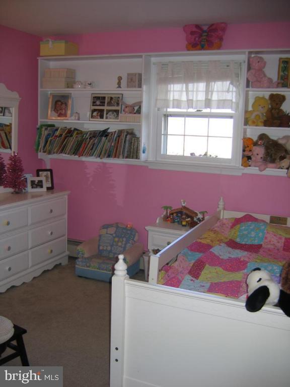 664 West Church Road Ephrata, PA 17522 - Photo 13 of 18 a bedroom with a bed and a window