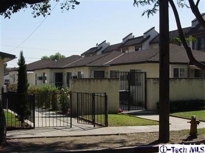 a front view of a house with a porch