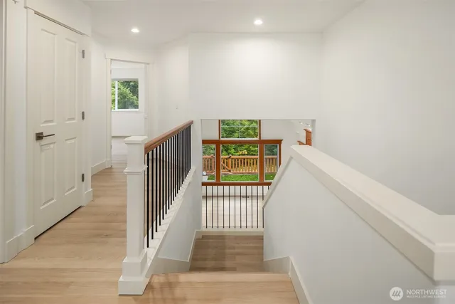 a view of a hallway with staircase