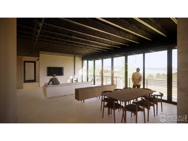 a living room with furniture and large windows
