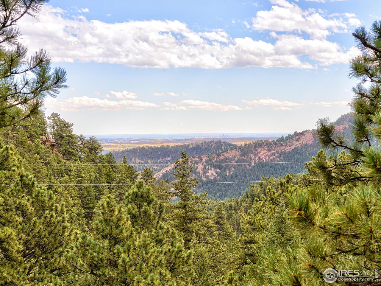 695 Cutter Lane Boulder, CO 80302 - Photo 6 of 39 a view of a city and mountains