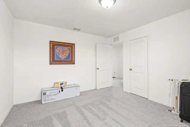 a view of a house with backyard porch and sitting area