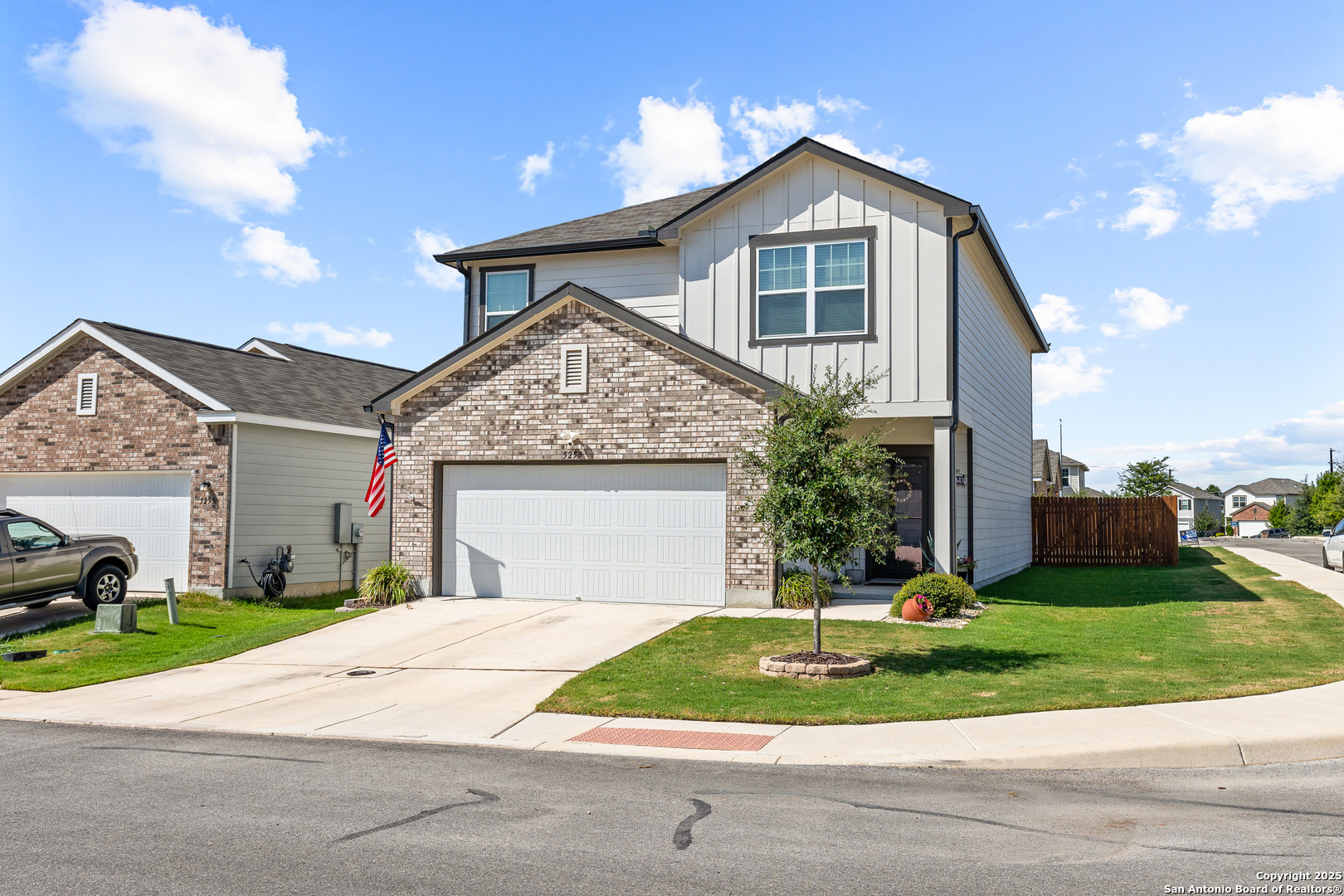 5259 Winding Streme St. Hedwig, TX 78152 - Photo 24 of 24 a front view of a house with a yard and garage