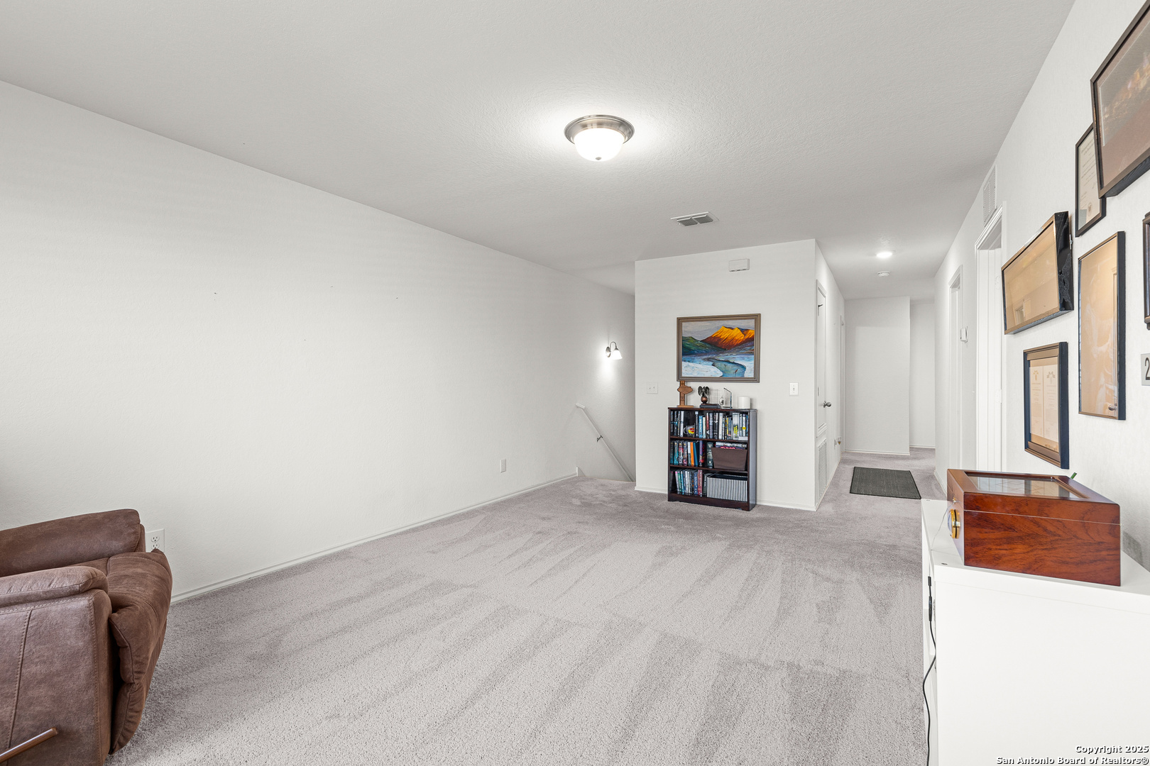 5259 Winding Streme St. Hedwig, TX 78152 - Photo 8 of 24 a view of an empty room with a window