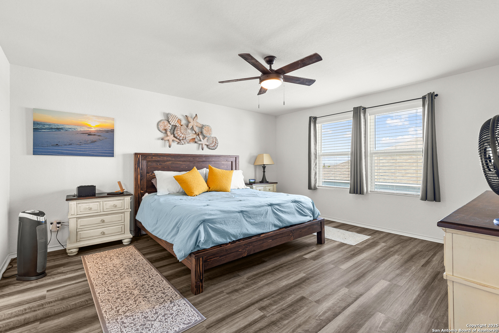 5259 Winding Streme St. Hedwig, TX 78152 - Photo 9 of 24 a spacious bedroom with a large bed and a window