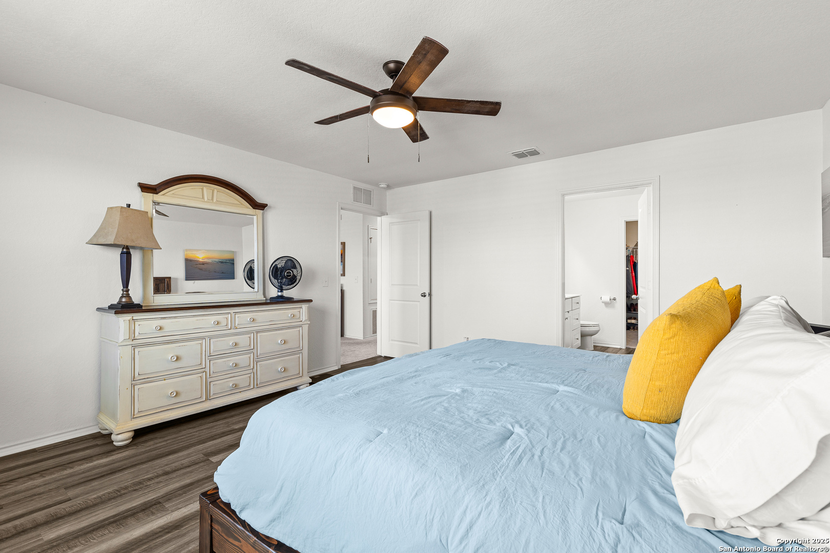 5259 Winding Streme St. Hedwig, TX 78152 - Photo 10 of 24 a bedroom with a bed and a dresser