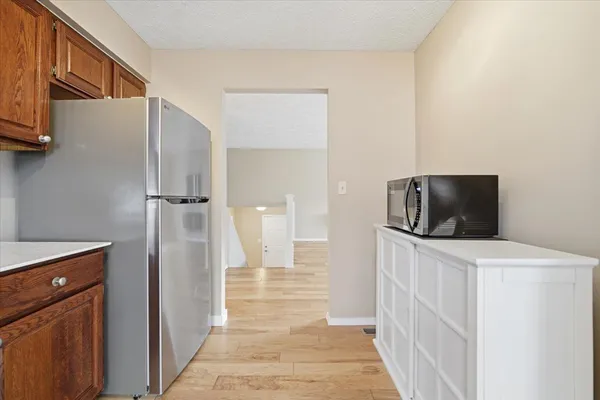 a view of a bedroom from a hallway