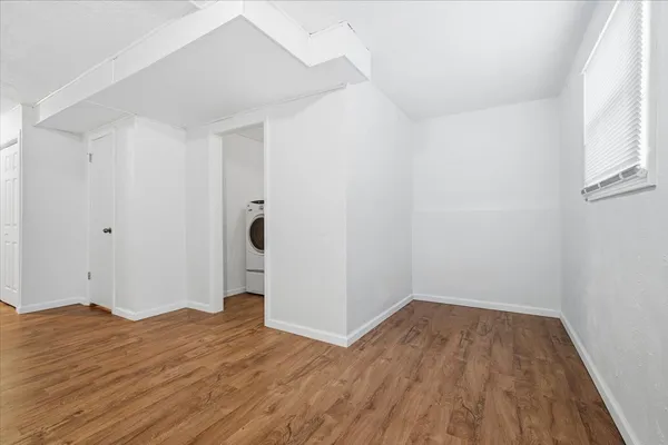 a bathroom with a sink toilet and a mirror