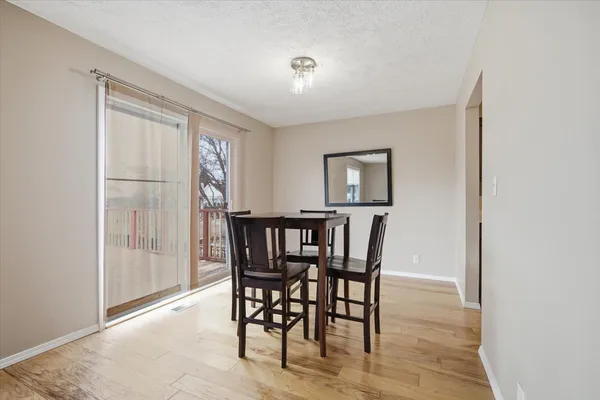 a view of a dining room with furniture