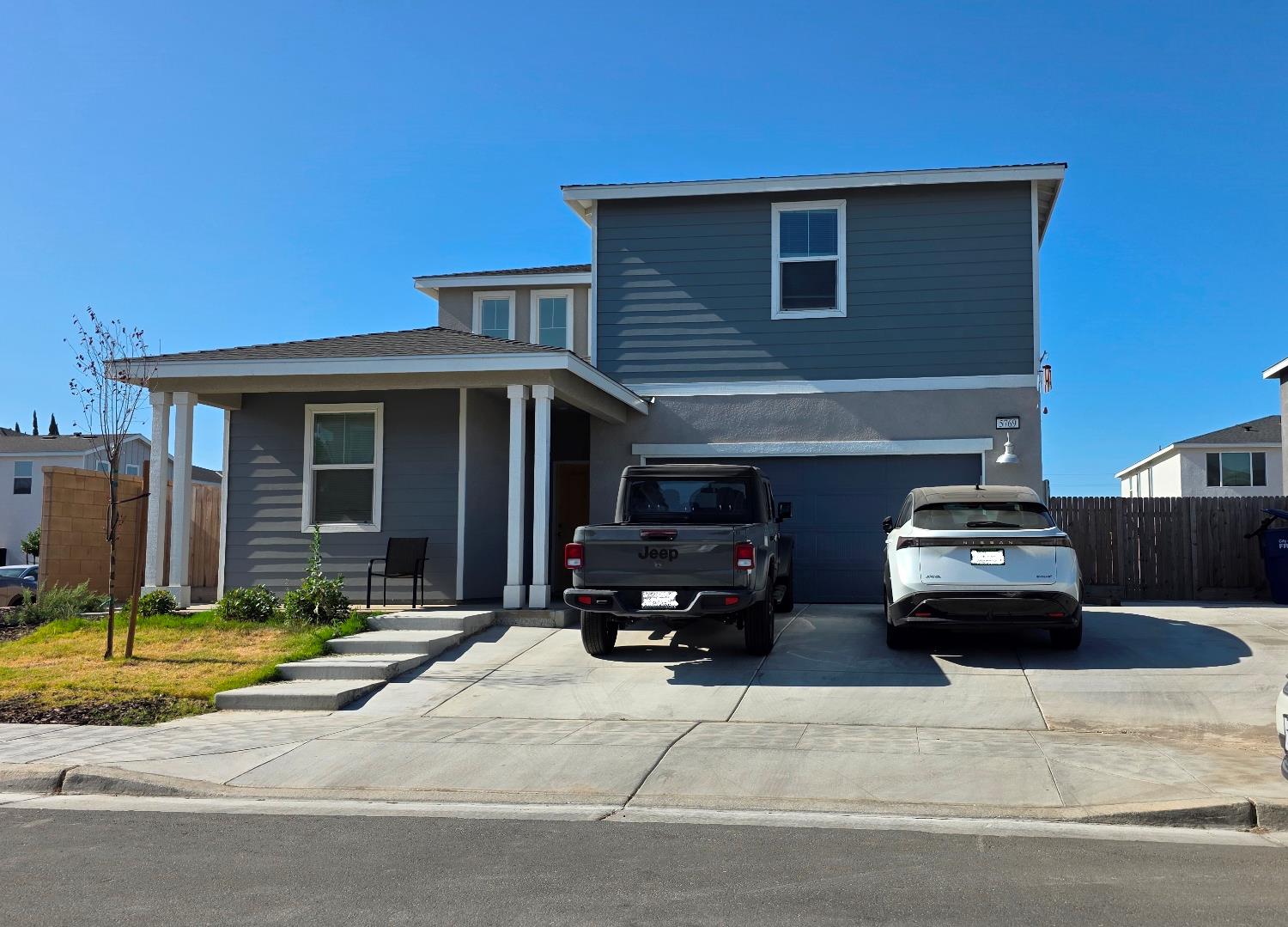 a car parked in front of a house