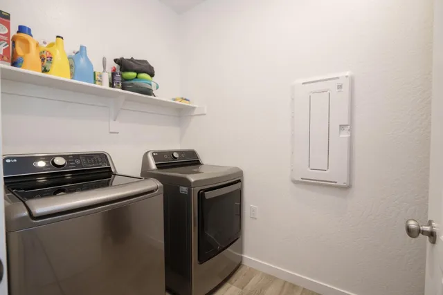 a utility room with dryer and washer
