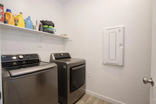 a utility room with dryer and washer