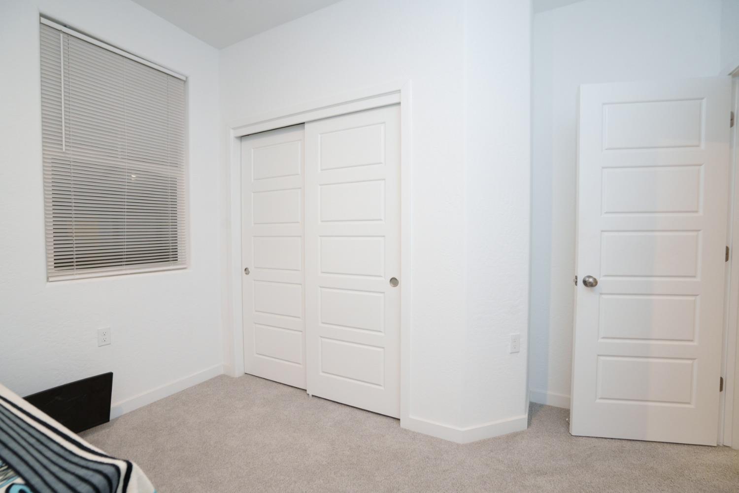 5769 West Austin Way Fresno, CA 93722 - Photo 23 of 32 a view of a livingroom with closet