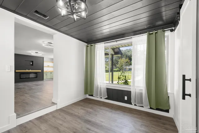 a view of an empty room and window