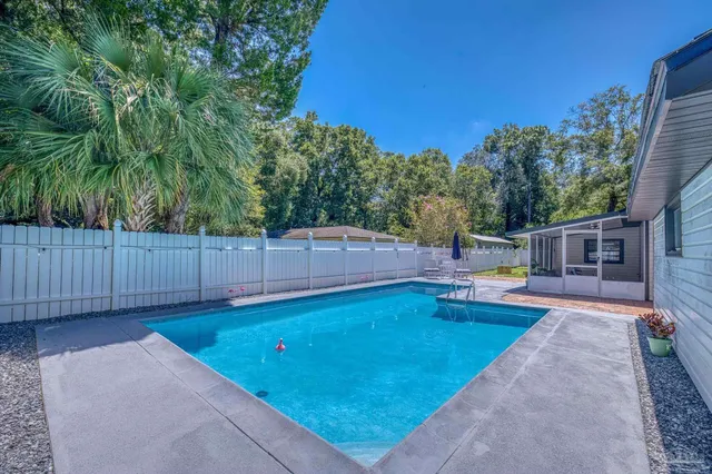 a backyard of a house with seating space