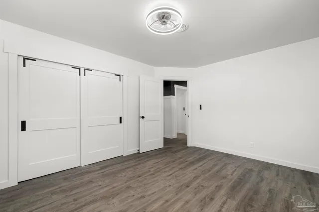 a view of livingroom with washer and dryer