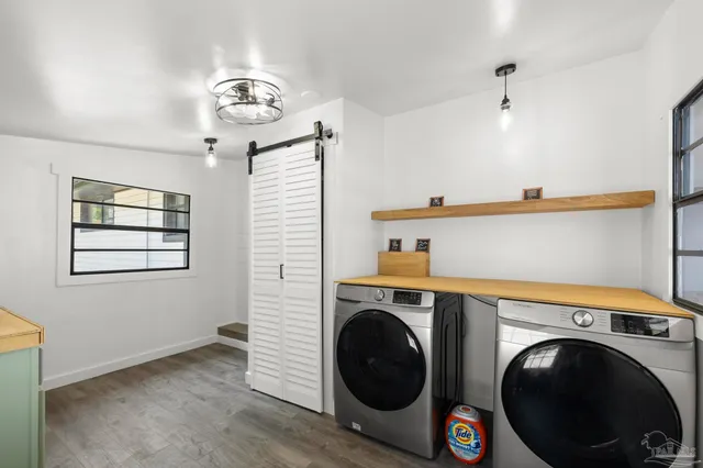 a view of swimming pool with seating space