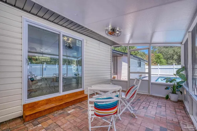 a outdoor space with lots of furniture and outdoor seating