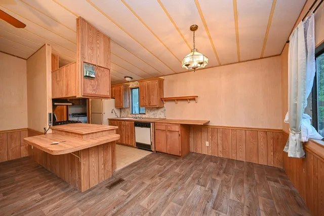 a view of an empty room with windows